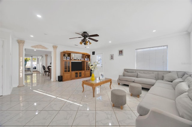 living room with recessed lighting, decorative columns, marble finish floor, and crown molding