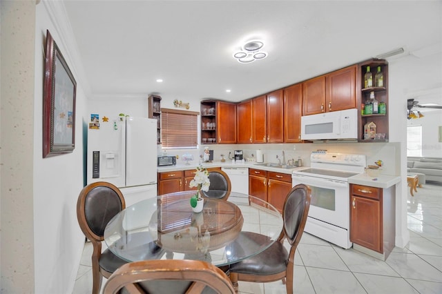 kitchen with light tile patterned flooring, white appliances, light countertops, and open shelves