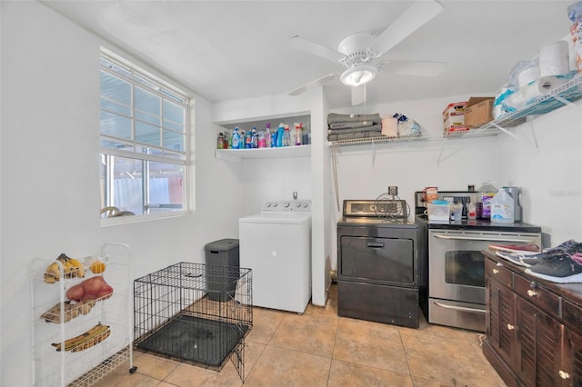 laundry area with light tile patterned floors, separate washer and dryer, ceiling fan, and laundry area