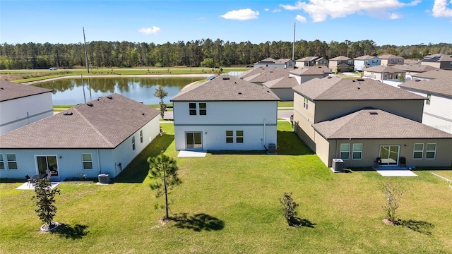 aerial view featuring a residential view and a water view