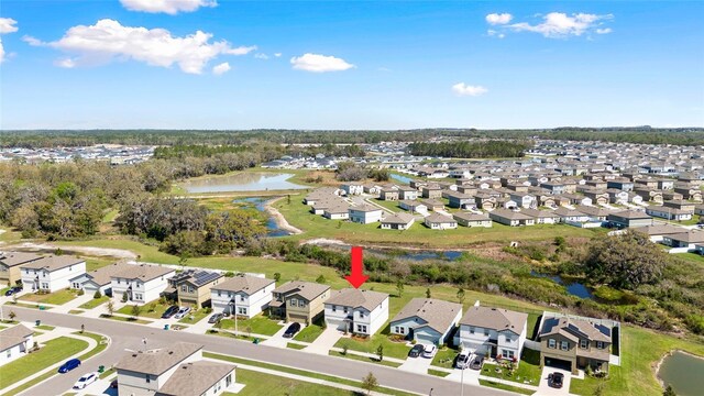 aerial view featuring a residential view and a water view