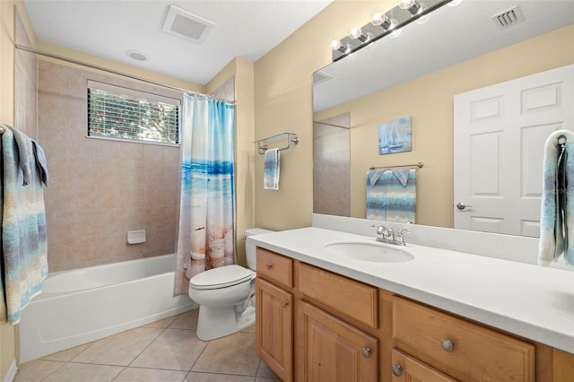 full bath with tile patterned flooring, toilet, vanity, and visible vents