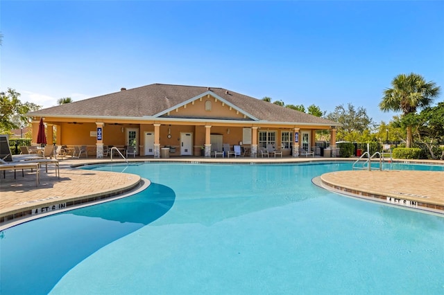 community pool featuring a patio