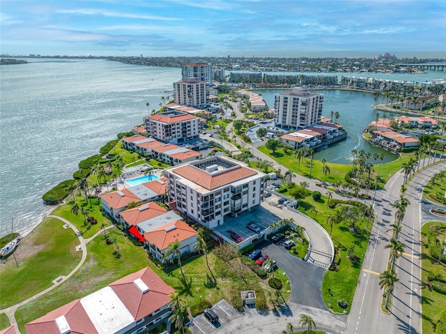 bird's eye view featuring a city view and a water view