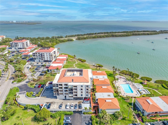 birds eye view of property featuring a water view