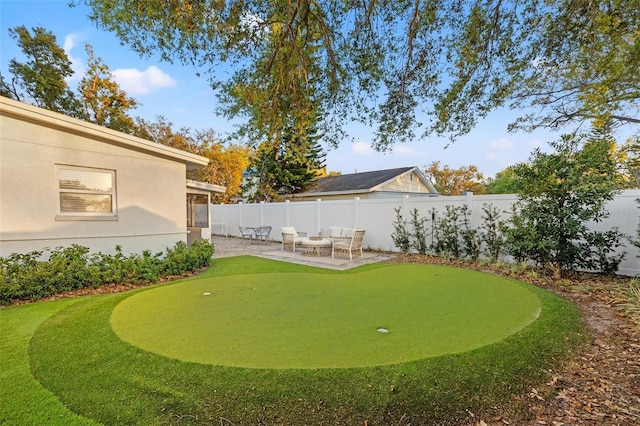 view of yard with a fenced backyard and a patio