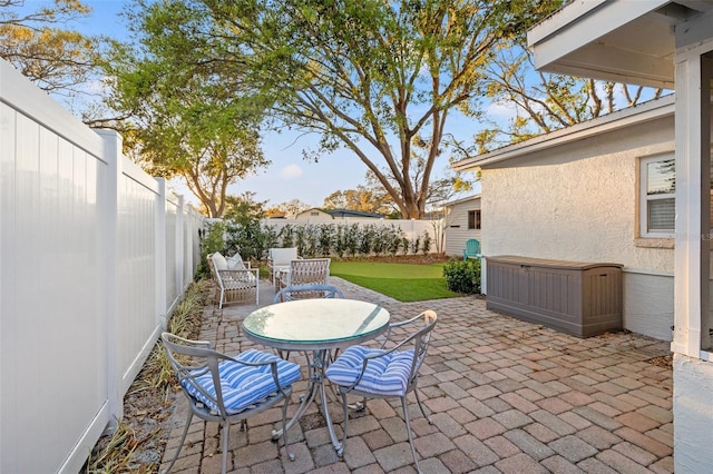 view of patio featuring a fenced backyard