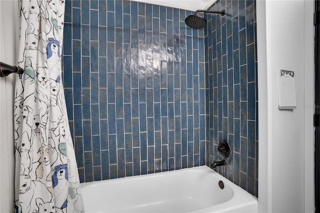 bathroom with shower / tub combo