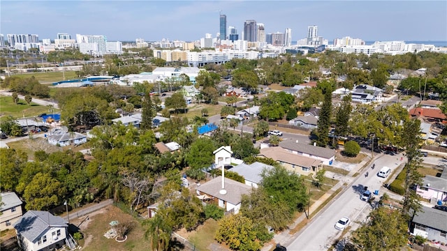 birds eye view of property with a view of city