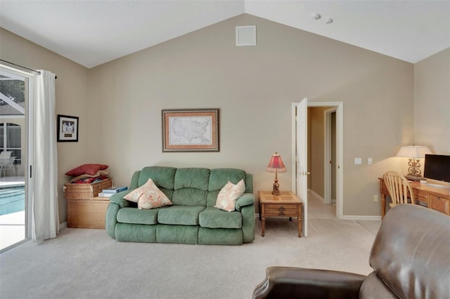 carpeted living room with lofted ceiling, baseboards, and visible vents