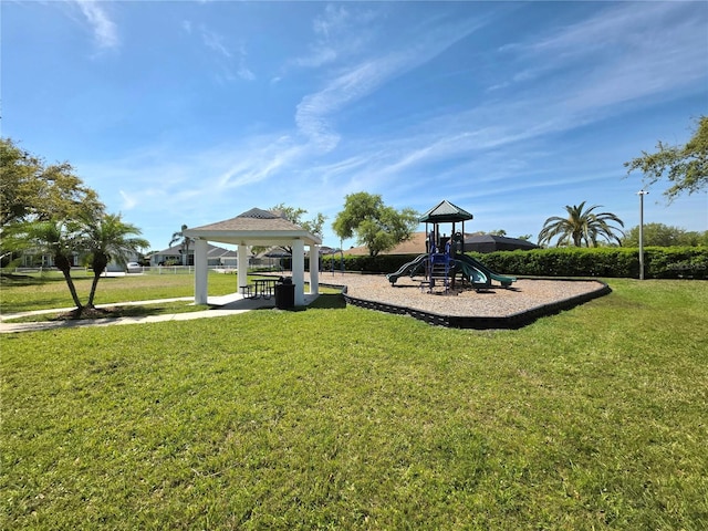 community jungle gym with a gazebo and a lawn