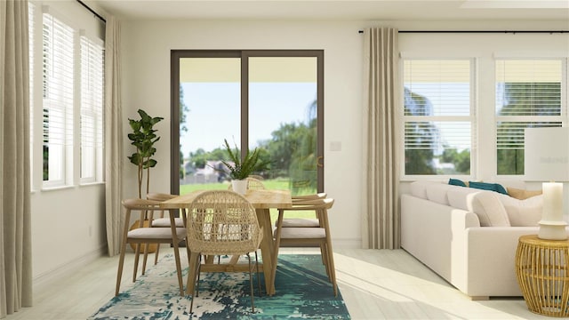 dining space featuring baseboards