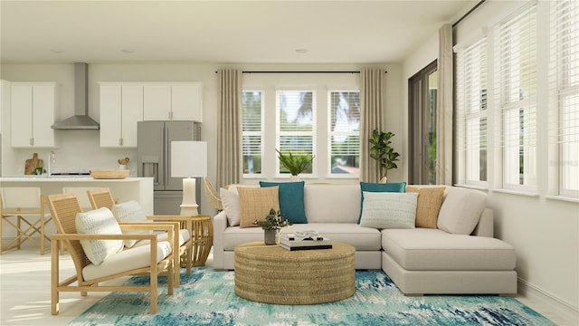 living area with baseboards and light wood finished floors