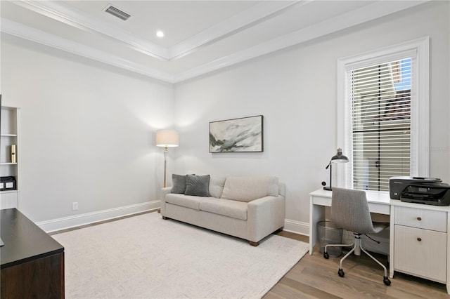 office area with baseboards, visible vents, light wood-style flooring, recessed lighting, and ornamental molding