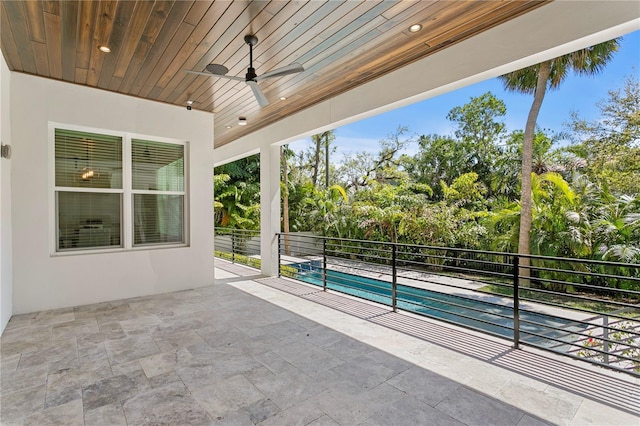 view of patio with ceiling fan