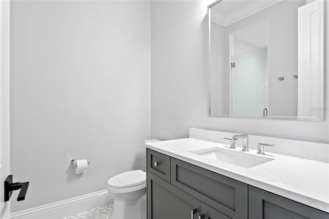 full bath with an enclosed shower, toilet, ornamental molding, baseboards, and vanity