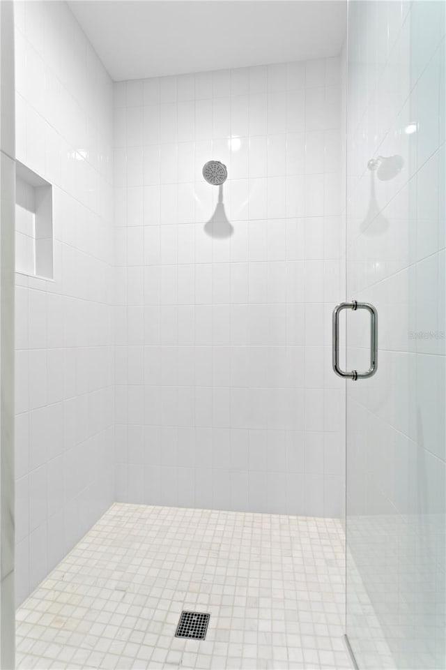 bathroom with a stall shower