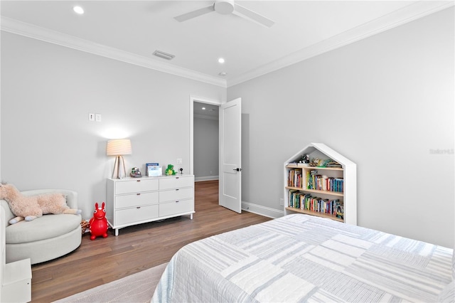 bedroom with visible vents, baseboards, ornamental molding, recessed lighting, and wood finished floors