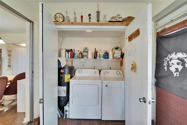 washroom with laundry area, independent washer and dryer, wood finished floors, and water heater