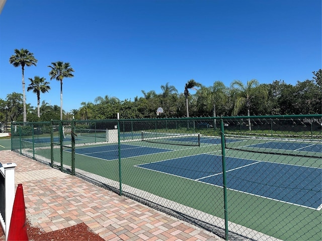 view of sport court with fence