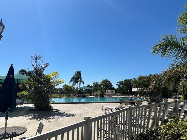 community pool with a patio