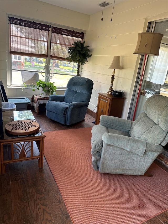 1902 Dandridge St Unit 6, Sun City Center, FL 33573 - living area featuring visible vents and wood finished floors