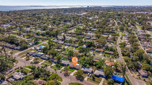 aerial view with a residential view and a water view