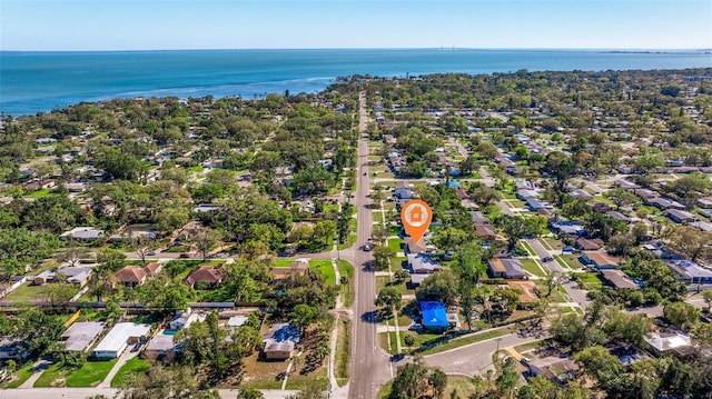 drone / aerial view featuring a residential view and a water view