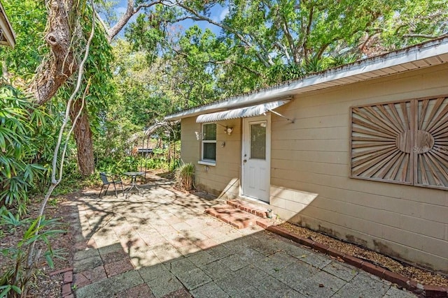 exterior space with a patio and outdoor dining area