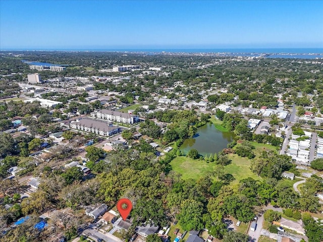 birds eye view of property featuring a water view