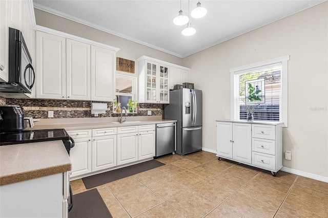 kitchen featuring backsplash, black appliances, light tile patterned flooring, white cabinetry, and a sink