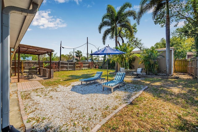 view of yard featuring a patio and a fenced backyard