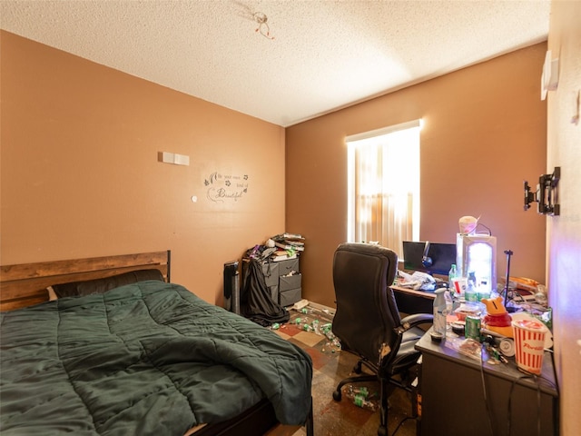 bedroom featuring a textured ceiling