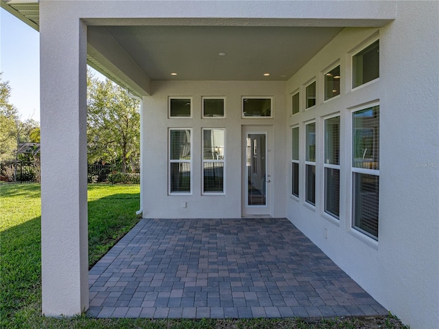 view of patio / terrace featuring fence