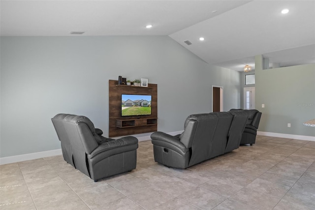 home theater room featuring recessed lighting, visible vents, lofted ceiling, and baseboards