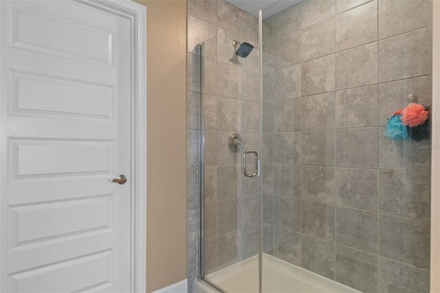 bathroom with a stall shower