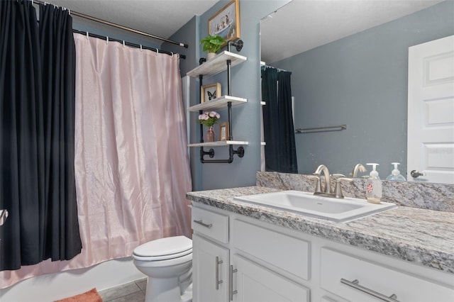 bathroom featuring tile patterned floors, shower / bath combo with shower curtain, toilet, and vanity