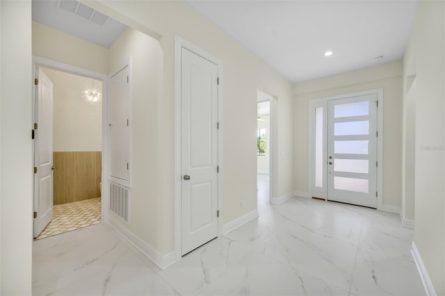 entryway featuring recessed lighting, visible vents, baseboards, and marble finish floor