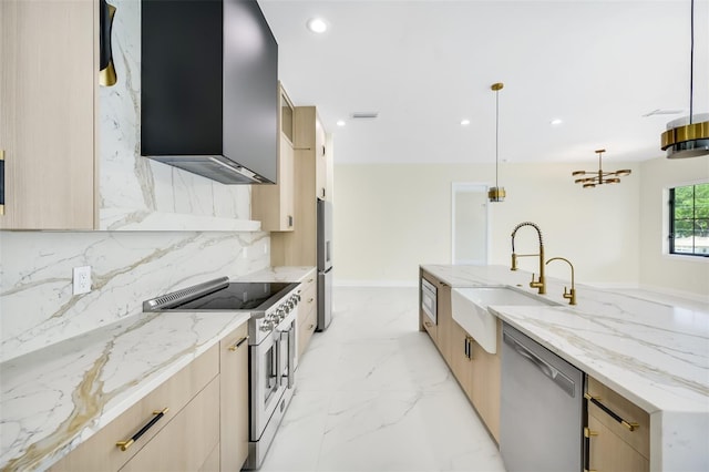 kitchen featuring a sink, stainless steel appliances, marble finish floor, and modern cabinets