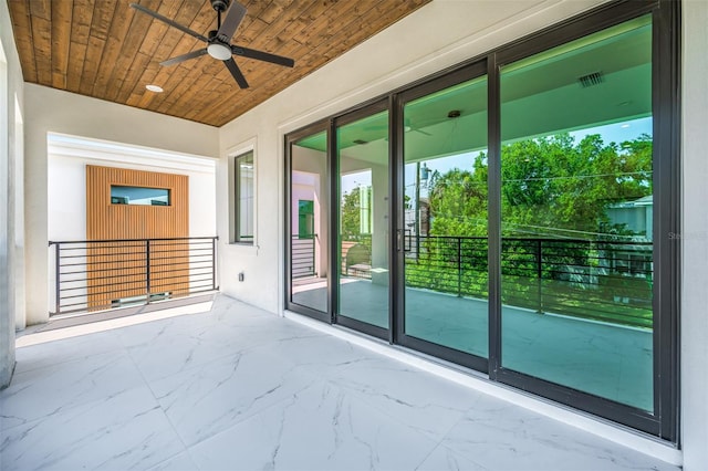 exterior space featuring visible vents and ceiling fan