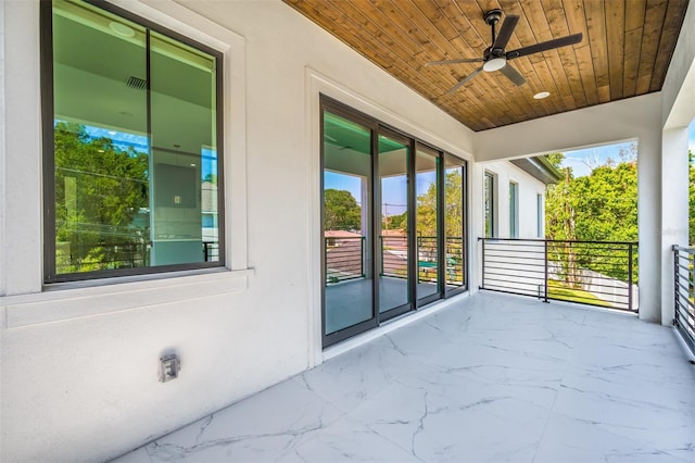 balcony featuring visible vents and ceiling fan