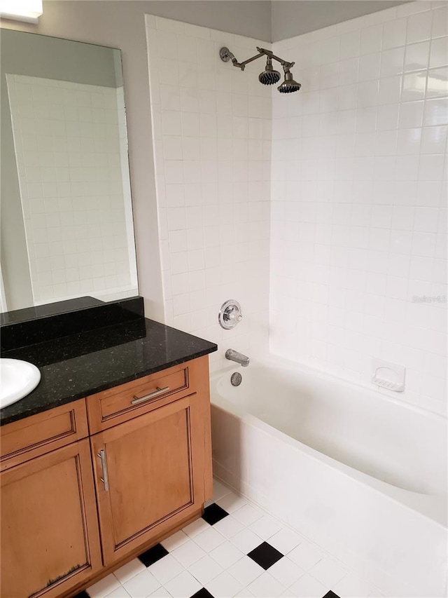 full bath with vanity,  shower combination, and tile patterned floors