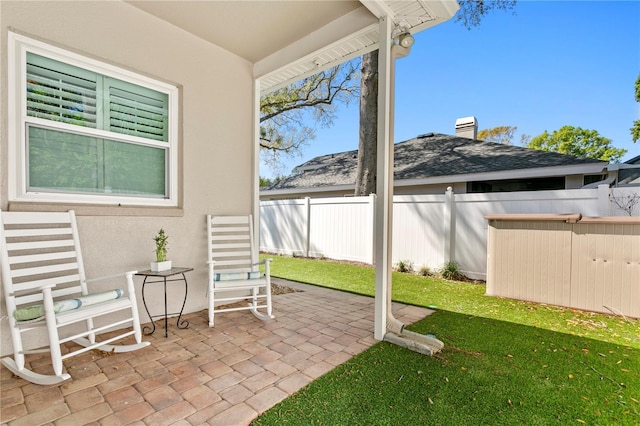 view of patio with fence