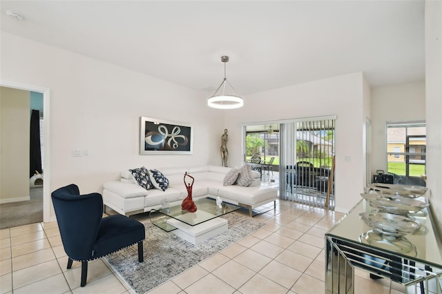 living area featuring light tile patterned floors and plenty of natural light