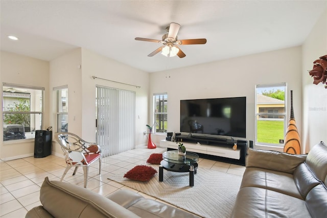 living room with tile patterned floors and a wealth of natural light