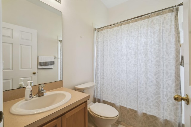 full bathroom featuring vanity, toilet, and shower / tub combo