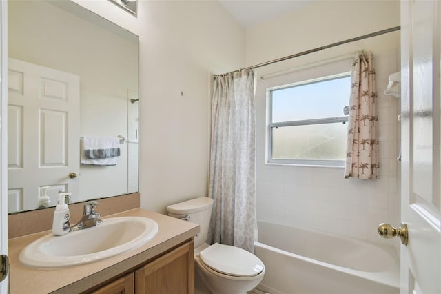 full bathroom with toilet, shower / bath combo, and vanity