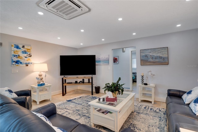 living room featuring recessed lighting, visible vents, baseboards, and light tile patterned floors