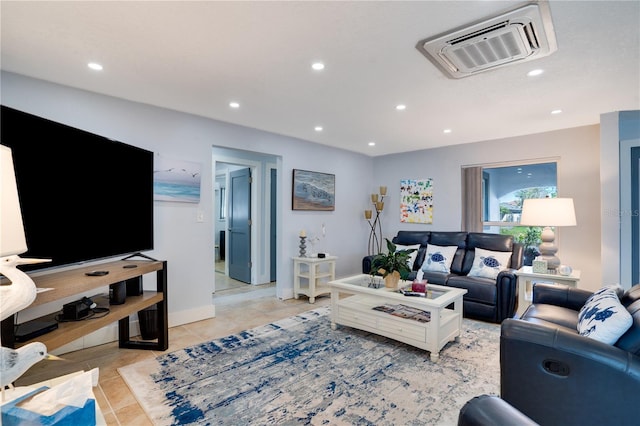 living room with recessed lighting, baseboards, and light tile patterned flooring