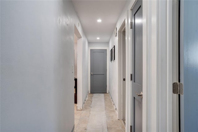 corridor featuring recessed lighting